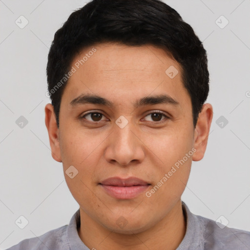 Joyful asian young-adult male with short  black hair and brown eyes