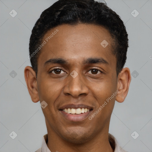 Joyful latino young-adult male with short  black hair and brown eyes
