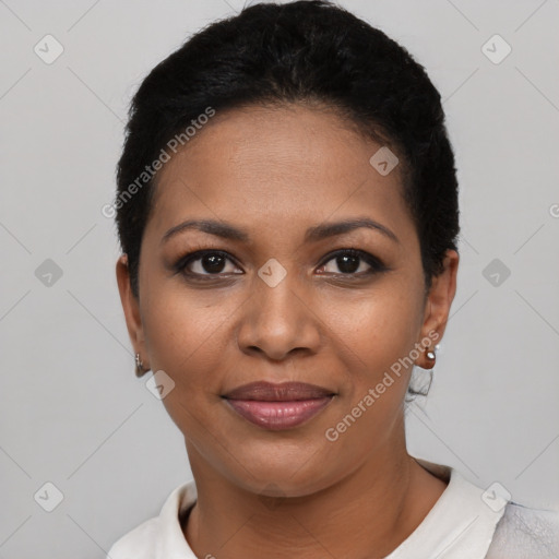 Joyful latino young-adult female with short  black hair and brown eyes