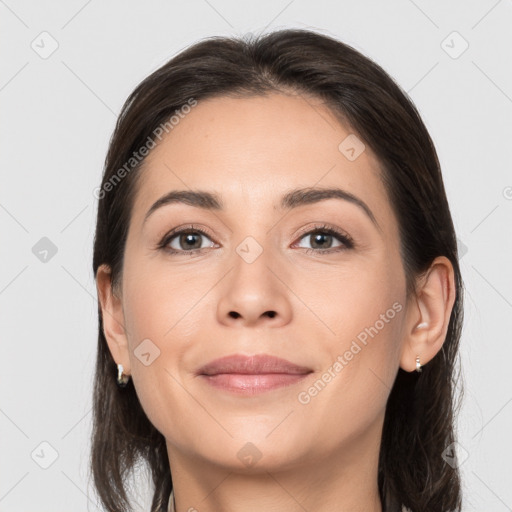 Joyful white young-adult female with long  brown hair and brown eyes