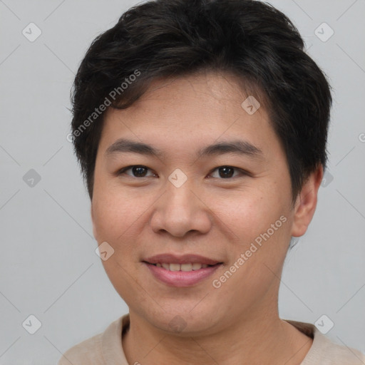 Joyful asian young-adult male with short  brown hair and brown eyes