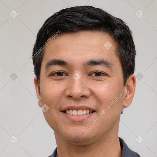 Joyful white young-adult male with short  black hair and brown eyes