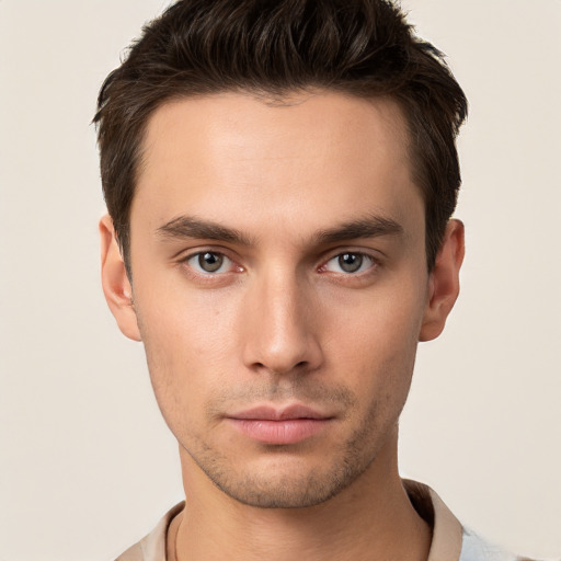 Neutral white young-adult male with short  brown hair and brown eyes