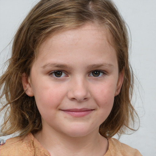 Joyful white child female with medium  brown hair and grey eyes