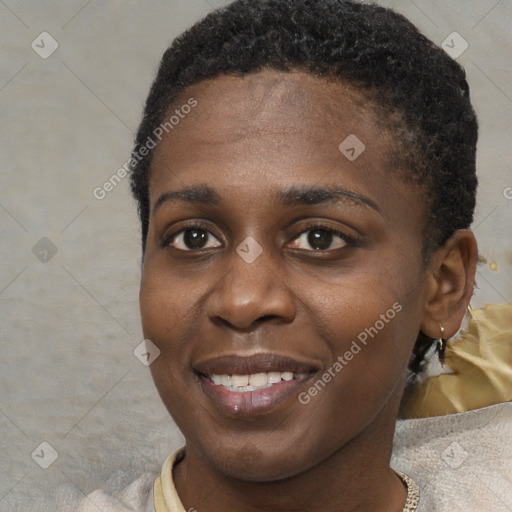 Joyful black young-adult female with short  brown hair and brown eyes