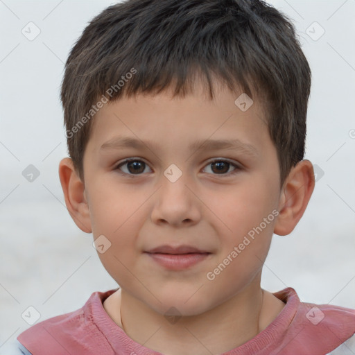 Joyful white child male with short  brown hair and brown eyes