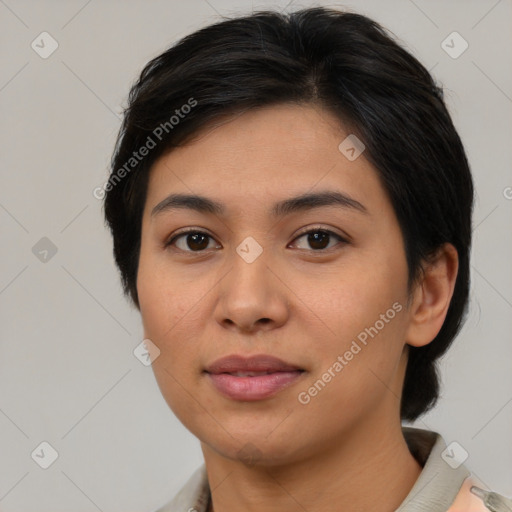 Joyful asian young-adult female with medium  black hair and brown eyes