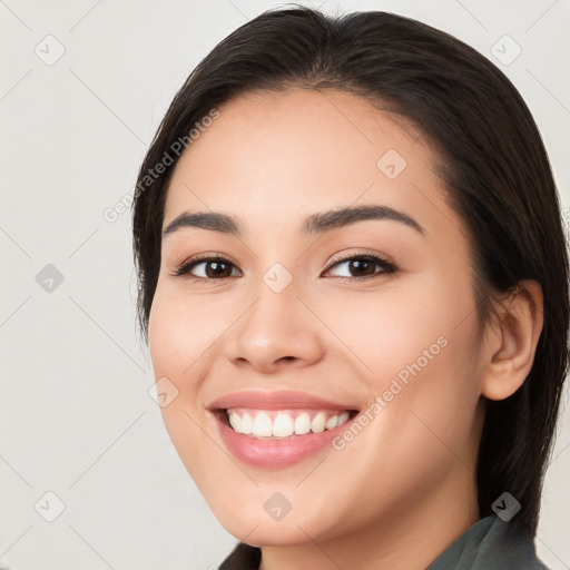 Joyful white young-adult female with medium  brown hair and brown eyes