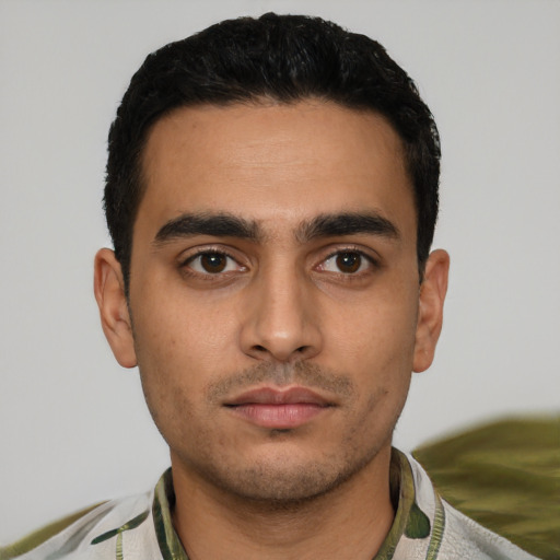 Neutral latino young-adult male with short  black hair and brown eyes