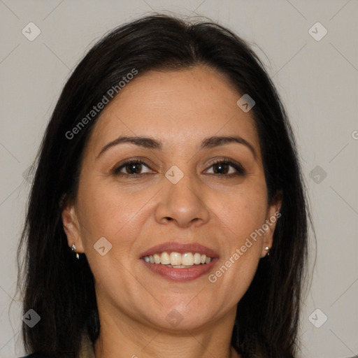 Joyful white adult female with long  brown hair and brown eyes