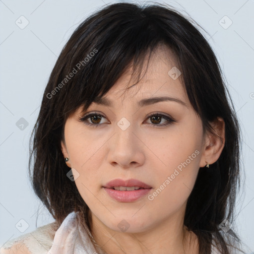 Joyful asian young-adult female with medium  brown hair and brown eyes