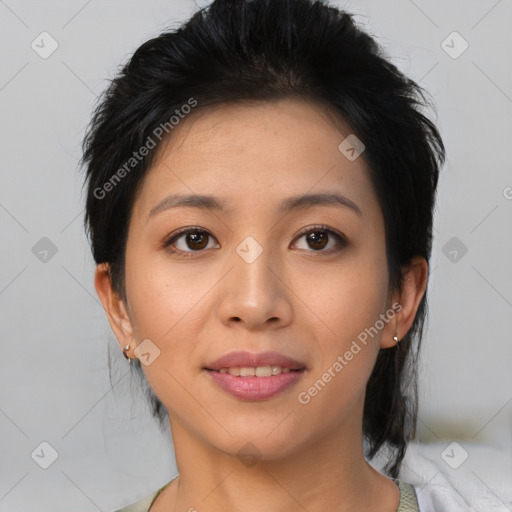 Joyful asian young-adult female with medium  black hair and brown eyes