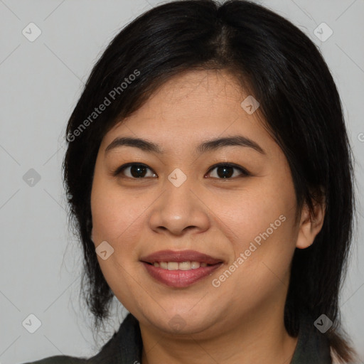 Joyful asian young-adult female with medium  brown hair and brown eyes