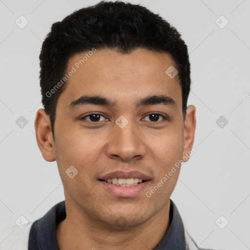 Joyful latino young-adult male with short  brown hair and brown eyes