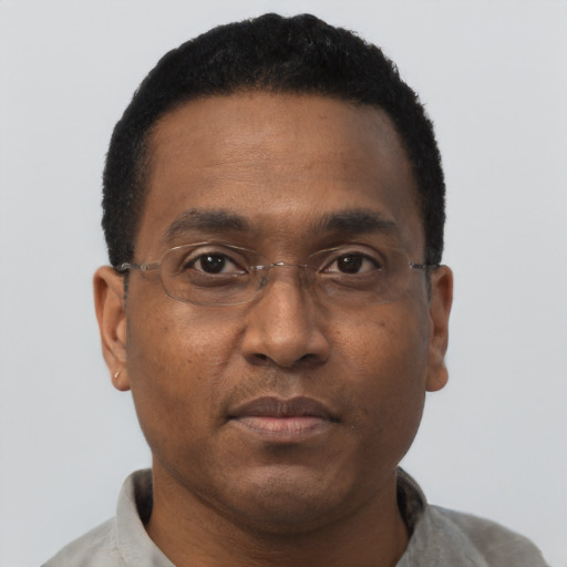 Neutral black adult male with short  black hair and brown eyes