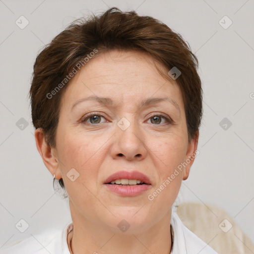 Joyful white adult female with short  brown hair and brown eyes