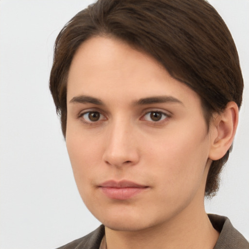 Neutral white young-adult female with short  brown hair and brown eyes