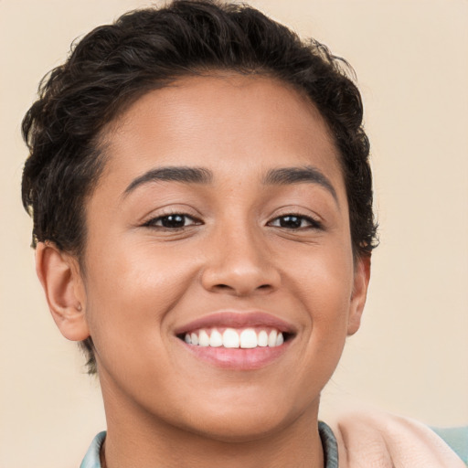 Joyful white young-adult female with short  brown hair and brown eyes