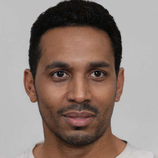 Neutral black young-adult male with short  black hair and brown eyes
