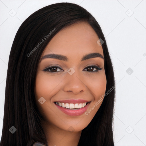 Joyful latino young-adult female with long  black hair and brown eyes