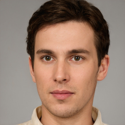 Neutral white young-adult male with short  brown hair and brown eyes