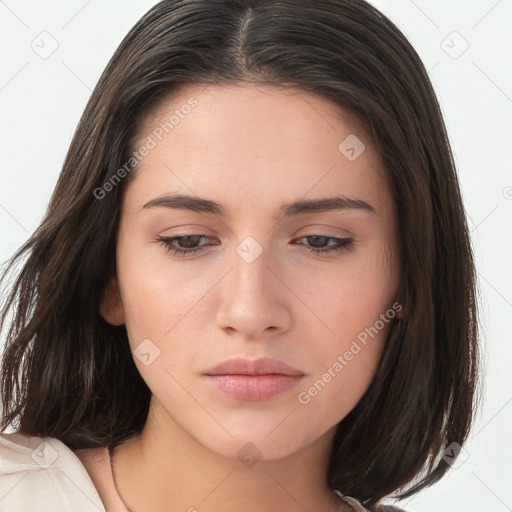 Neutral white young-adult female with long  brown hair and brown eyes