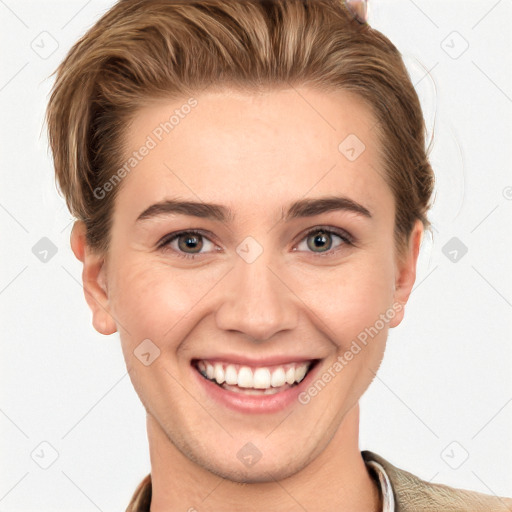 Joyful white young-adult female with short  brown hair and grey eyes