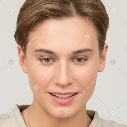 Joyful white young-adult female with short  brown hair and grey eyes