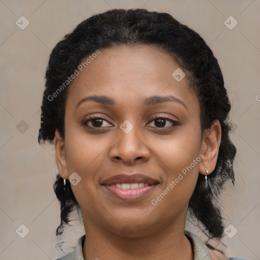 Joyful black young-adult female with medium  black hair and brown eyes