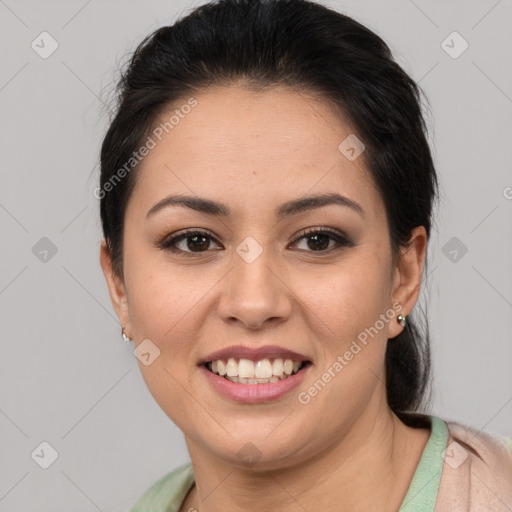 Joyful latino young-adult female with short  brown hair and brown eyes