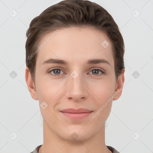 Joyful white young-adult female with short  brown hair and grey eyes