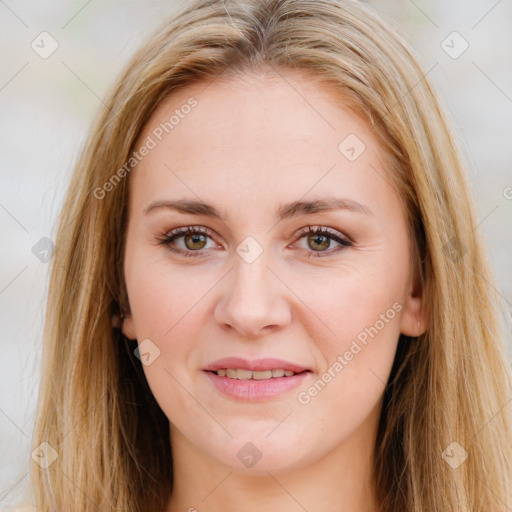 Joyful white young-adult female with long  brown hair and green eyes