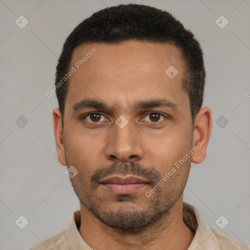 Neutral latino young-adult male with short  black hair and brown eyes