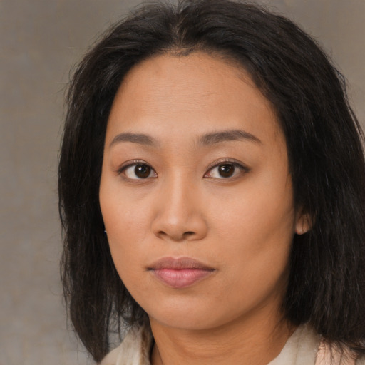Neutral asian young-adult female with medium  brown hair and brown eyes