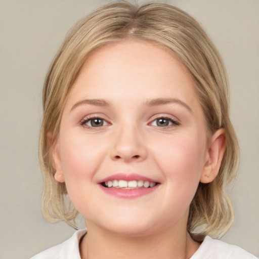 Joyful white young-adult female with medium  brown hair and blue eyes