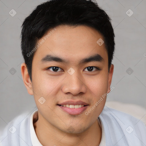 Joyful latino young-adult male with short  brown hair and brown eyes