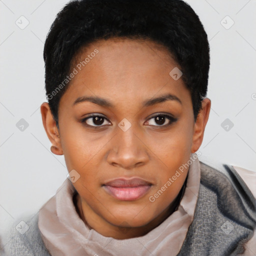 Joyful black young-adult female with short  black hair and brown eyes