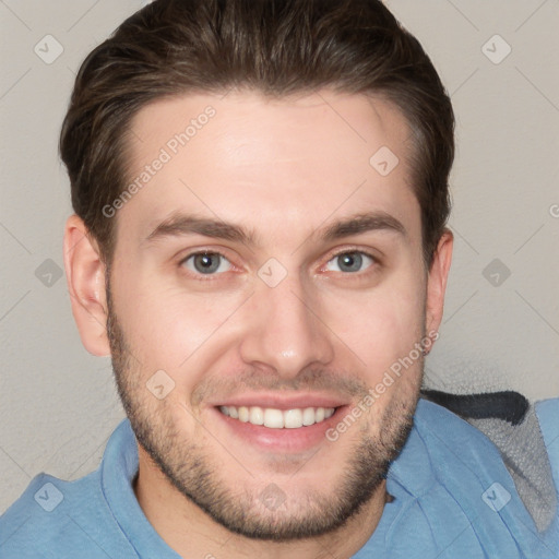 Joyful white young-adult male with short  brown hair and grey eyes