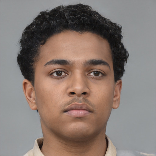 Neutral latino young-adult male with short  brown hair and brown eyes