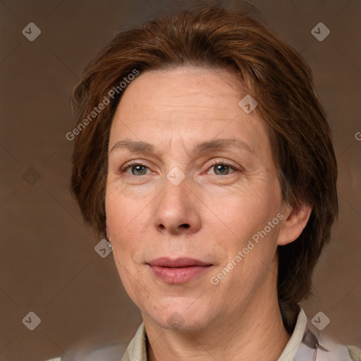 Joyful white adult female with medium  brown hair and grey eyes