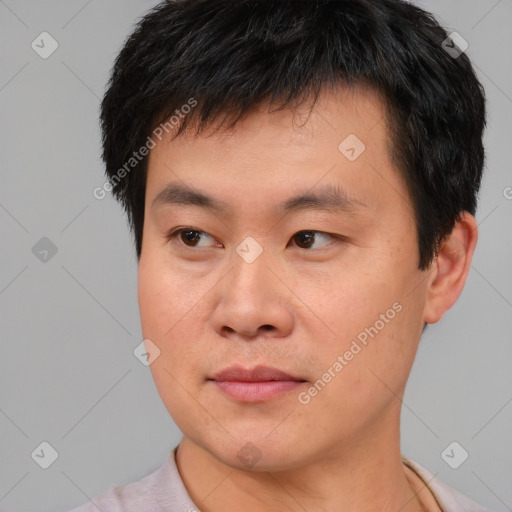 Neutral asian young-adult male with short  brown hair and brown eyes