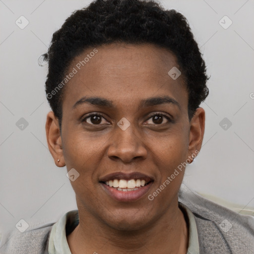 Joyful black young-adult female with short  black hair and brown eyes