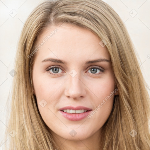 Joyful white young-adult female with long  brown hair and green eyes