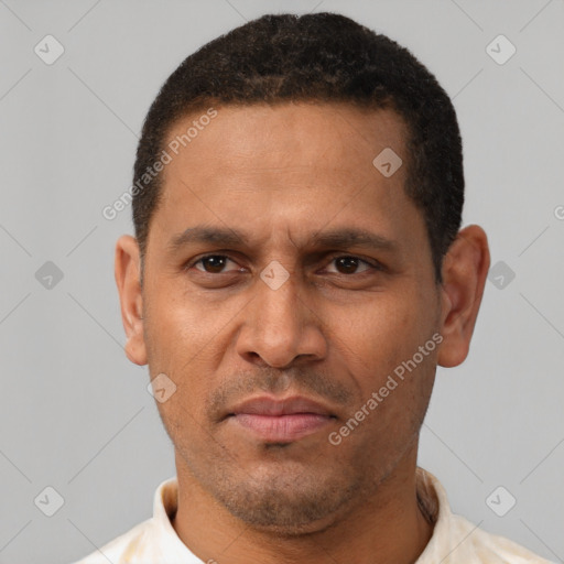 Neutral latino adult male with short  black hair and brown eyes