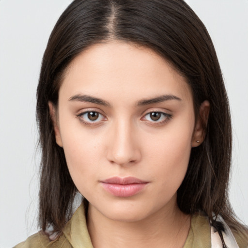 Neutral white young-adult female with medium  brown hair and brown eyes