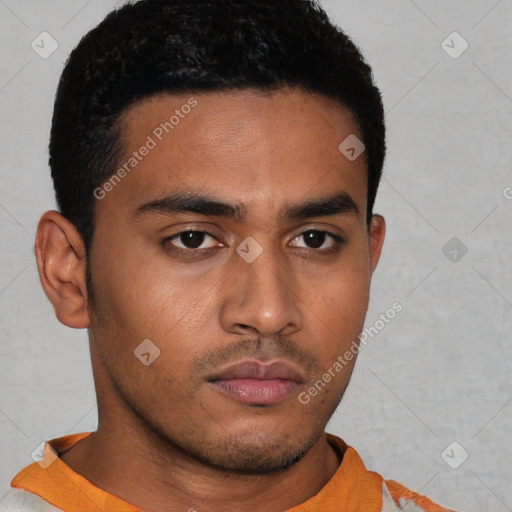 Neutral latino young-adult male with short  black hair and brown eyes