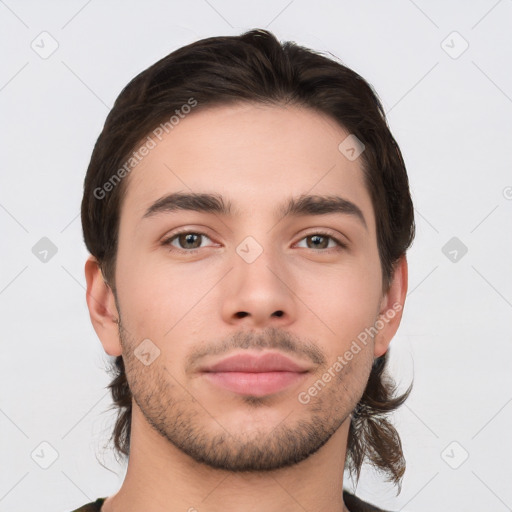 Neutral white young-adult male with short  brown hair and brown eyes