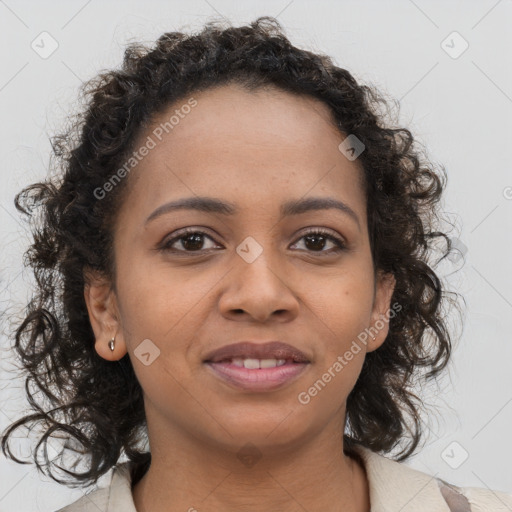 Joyful black young-adult female with medium  brown hair and brown eyes