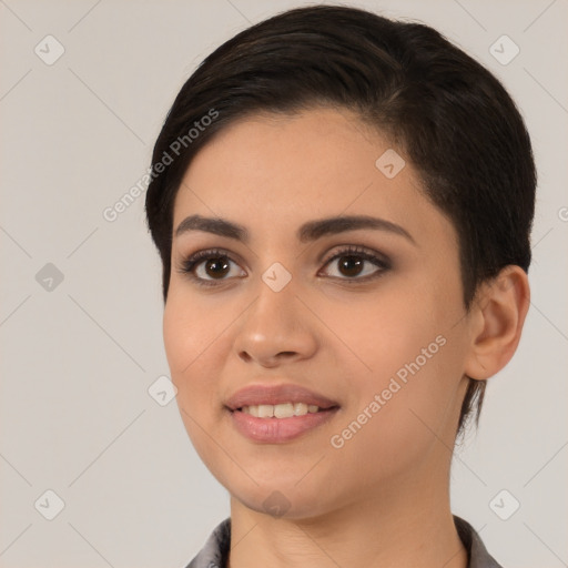 Joyful white young-adult female with medium  black hair and brown eyes