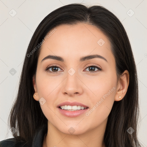 Joyful white young-adult female with long  black hair and brown eyes